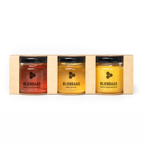 Twee giftsets van elk drie potjes honing